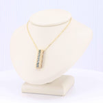 Load image into Gallery viewer, Montana Sapphire Bar Pendant, 1.28cttw in 14K Yellow Gold, 20 inch Chain - Kizer Cummings Jewelers