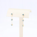 Load image into Gallery viewer, London Blue Topaz Drop Earrings, 0.84cttw in 14K Yellow Gold - Kizer Cummings Jewelers