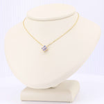 Load image into Gallery viewer, Tanzanite Quatrefoil Pendant, 0.27cttw in 14K Yellow Gold, 18 inch Chain