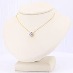 Load image into Gallery viewer, Tanzanite Quatrefoil Pendant, 0.27cttw in 14K Yellow Gold, 18 inch Chain - Kizer Cummings Jewelers
