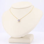 Load image into Gallery viewer, Tanzanite Quatrefoil Pendant, 0.27cttw in 14K Yellow Gold, 18 inch Chain