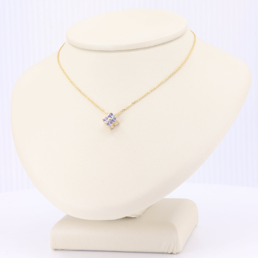 Icy Tanzanite Quatrefoil Pendant in Yellow Gold