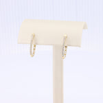 Load image into Gallery viewer, Diamond Hoop Earrings in Yellow Gold - 0.25cttw