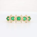 Load image into Gallery viewer, Gold ring featuring vibrant green emeralds and sparkling diamonds, perfect for elegant occasions.