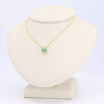 Load image into Gallery viewer, Emerald Quatrefoil Pendant in Yellow Gold