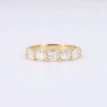 Load image into Gallery viewer, Gold five-stone ring featuring sparkling round diamonds, perfect for engagement or anniversary gifts.