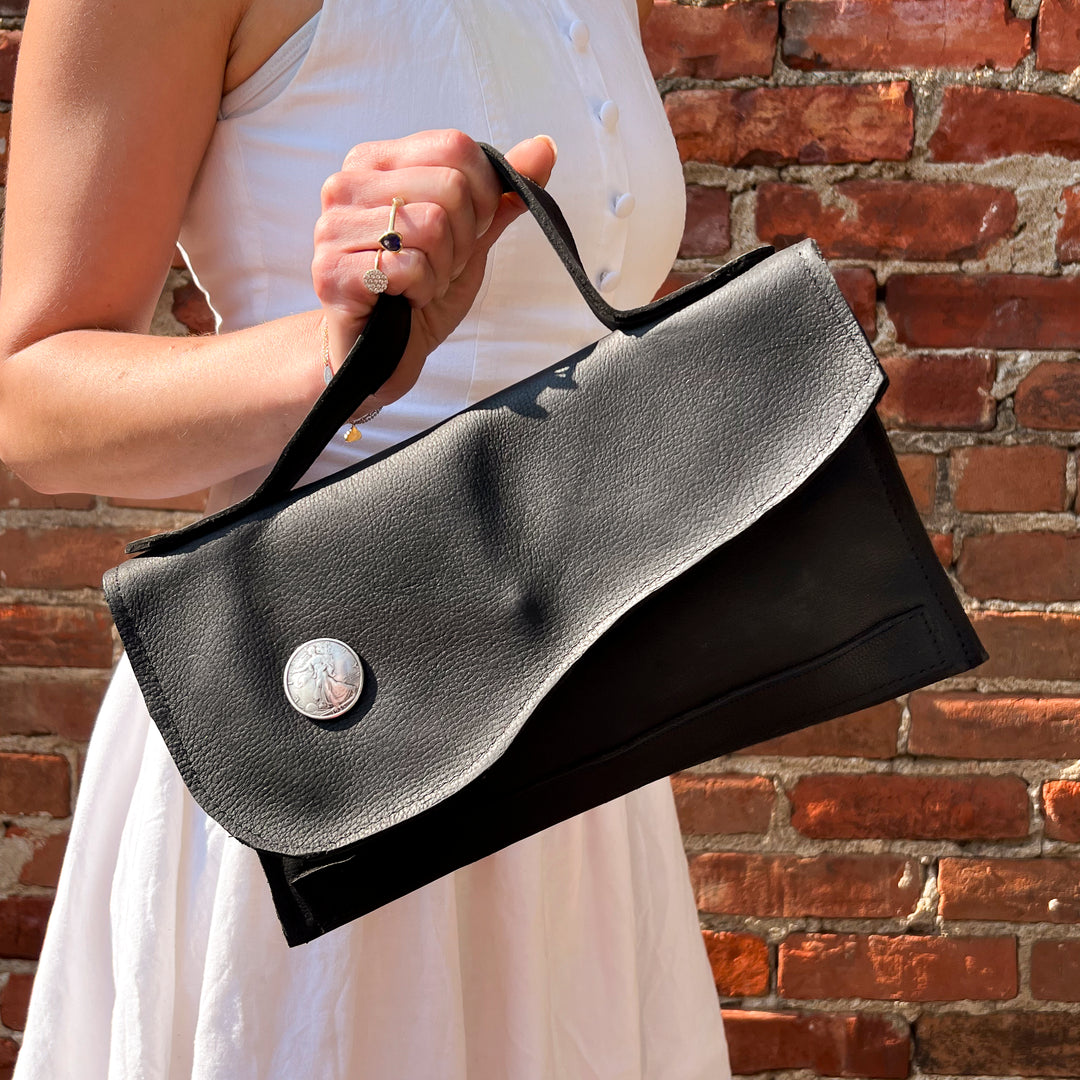 Matte Black Leather Asymmetrical Clutch Bag with white Metal Hardware