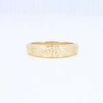 Load image into Gallery viewer, Elegant gold floral pattern band ring, crafted in polished metal for a timeless, vintage-inspired look.