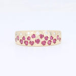 Load image into Gallery viewer, Gold band ring with pink sapphires and diamond accents, floral design, elegant and stylish for any occasion.