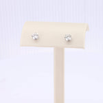 Load image into Gallery viewer, Sterling silver stud earrings with brilliant round clear cubic zirconia gemstones. Elegant and timeless design.