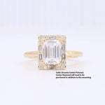 Load image into Gallery viewer, Elegant gold ring with an emerald-cut cubic zirconia center, surrounded by sparkling accents, perfect for special occasions.