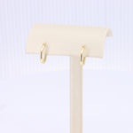 Load image into Gallery viewer, Huggie Earrings in Yellow Gold