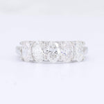 Load image into Gallery viewer, Elegant five-stone oval diamond ring in white gold, showcasing sparkling clear diamonds in a timeless design.