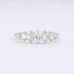 Load image into Gallery viewer, Silver five-stone diamond ring with round cut diamonds, showcasing exceptional sparkle and elegant design.
