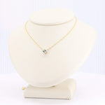 Load image into Gallery viewer, Gold chain necklace with a clear gemstone pendant, elegant and minimalist design. Perfect for everyday wear.