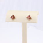 Load image into Gallery viewer, Copper Garnet Quatrefoil Earrings in Yellow Gold