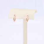 Load image into Gallery viewer, Huggie Earrings in Rose Gold