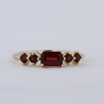 Load image into Gallery viewer, East-West Emerald-Cut Garnet Ring in Yellow Gold
