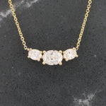 Load image into Gallery viewer, Oval Diamond East West 3 Stone Necklace, 0.44ct Center with 0.18cttw Trim in 14K Yellow Gold, 18 inch