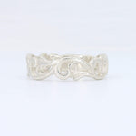 Load image into Gallery viewer, Elegant silver ring with intricate swirling designs, crafted from high-quality metal for a stylish finish.