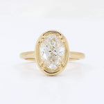 Load image into Gallery viewer, Lab Grown Diamond Faux Bezel Ring, 2.02ct F VS1 Oval Diamond with 0.13cttw Hidden Halo Diamonds in 14K Yellow Gold - Kizer Cummings Jewelers