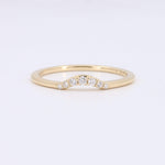 Load image into Gallery viewer, Elegant gold ring with five sparkling white diamonds in a curved design, perfect for stacking or as a promise ring.