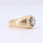 Load image into Gallery viewer, Gold textured ring featuring a grey raw diamond centerpiece, perfect for unique, modern jewelry collections.
