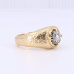 Load image into Gallery viewer, Gold textured ring featuring a gray diamond centerpiece in an elegant, organic style.