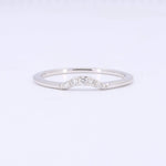 Load image into Gallery viewer, Sleek silver stacking ring with a curved design and sparkling clear gemstones, perfect for everyday elegance.