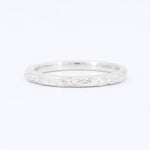Load image into Gallery viewer, Sterling silver floral engraved stacking ring, featuring intricate detailing and a polished finish.