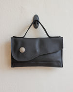 Load image into Gallery viewer, Matte Black Leather Asymmetrical Clutch Bag with white Metal Hardware