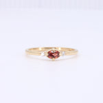 Load image into Gallery viewer, East-West Oval Garnet Ring with Diamond Trim in Yellow Gold