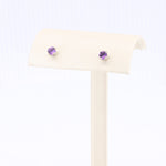 Load image into Gallery viewer, Elegant purple amethyst stud earrings in sterling silver, showcasing a classic and timeless design.