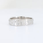 Load image into Gallery viewer, Silver textured ring with sparkling diamonds, featuring a modern design and polished finish.