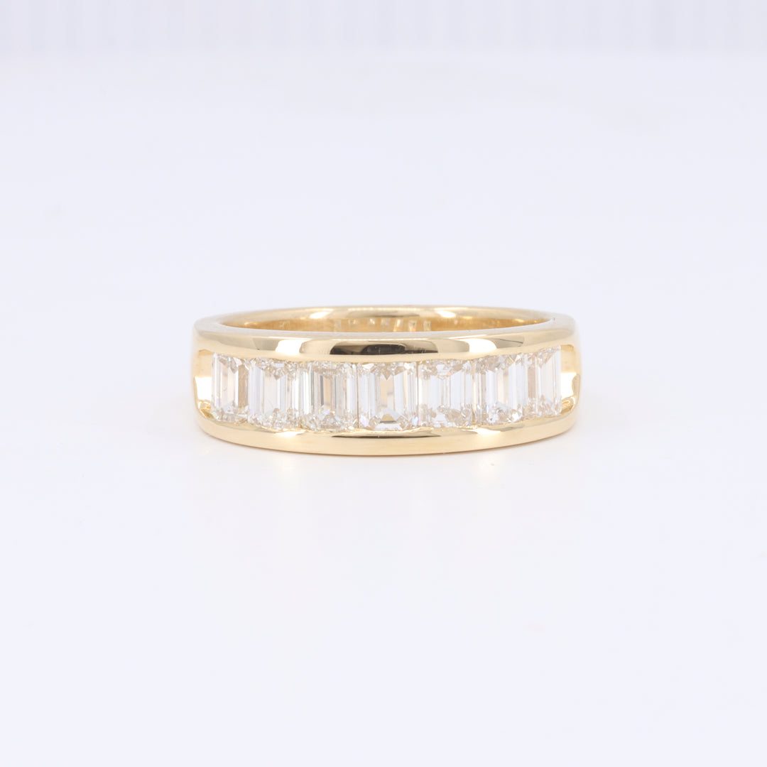 Seven Stone Emerald Cut Diamond Channel Band in Yellow Gold
