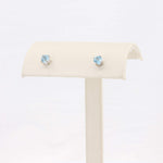 Load image into Gallery viewer, Light blue aquamarine stud earrings set in sterling silver, elegant and perfect for everyday wear.
