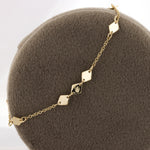Load image into Gallery viewer, Rhombus Station Chain Bracelet in Yellow Gold
