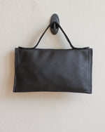 Load image into Gallery viewer, Matte Black Leather Asymmetrical Clutch Bag with white Metal Hardware