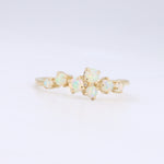 Load image into Gallery viewer, Gold opal cuff ring featuring five iridescent opals in a floral design, perfect for elegant everyday wear.