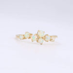 Load image into Gallery viewer, Gold opal cuff ring featuring five iridescent opals in a floral design, perfect for elegant everyday wear.