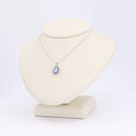 Load image into Gallery viewer, Aquamarine and Sapphire Halo Pendant, 0.40ct Aquamarine with 0.32cttw Sapphire Halo in 14K White Gold, 18 inch Chain