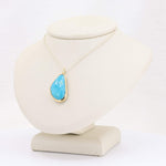Load image into Gallery viewer, Turquoise teardrop pendant necklace in gold setting on silver chain, elegant boho jewelry for women.