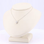 Load image into Gallery viewer, Silver chain necklace featuring a square cubic zirconia pendant on a display bust. Elegant and timeless design.