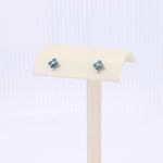 Load image into Gallery viewer, London Blue Topaz Quatrefoil Stud Earrings, 0.16cttw in 14K White Gold - Kizer Cummings Jewelers