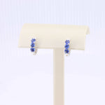 Load image into Gallery viewer, Sapphire Huggie Earrings, 1.20cttw in 14K White Gold - Kizer Cummings Jewelers
