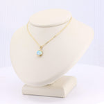 Load image into Gallery viewer, Gold chain necklace with a colorful opal pendant, elegant and perfect for casual or formal wear.