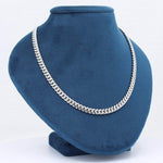 Load image into Gallery viewer, Silver stainless steel chain necklace on a blue velvet display bust. Perfect for casual and formal wear.