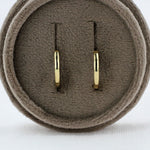Load image into Gallery viewer, Huggie Earrings in Yellow Gold
