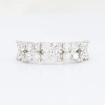 Load image into Gallery viewer, Elegant silver band ring adorned with sparkling round and oval cubic zirconia stones, perfect for any occasion.