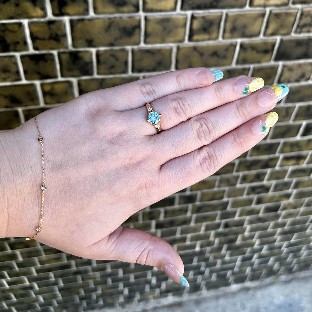 Montana Sapphire and Diamond Ring with Millgrain Ridge in Yellow Gold